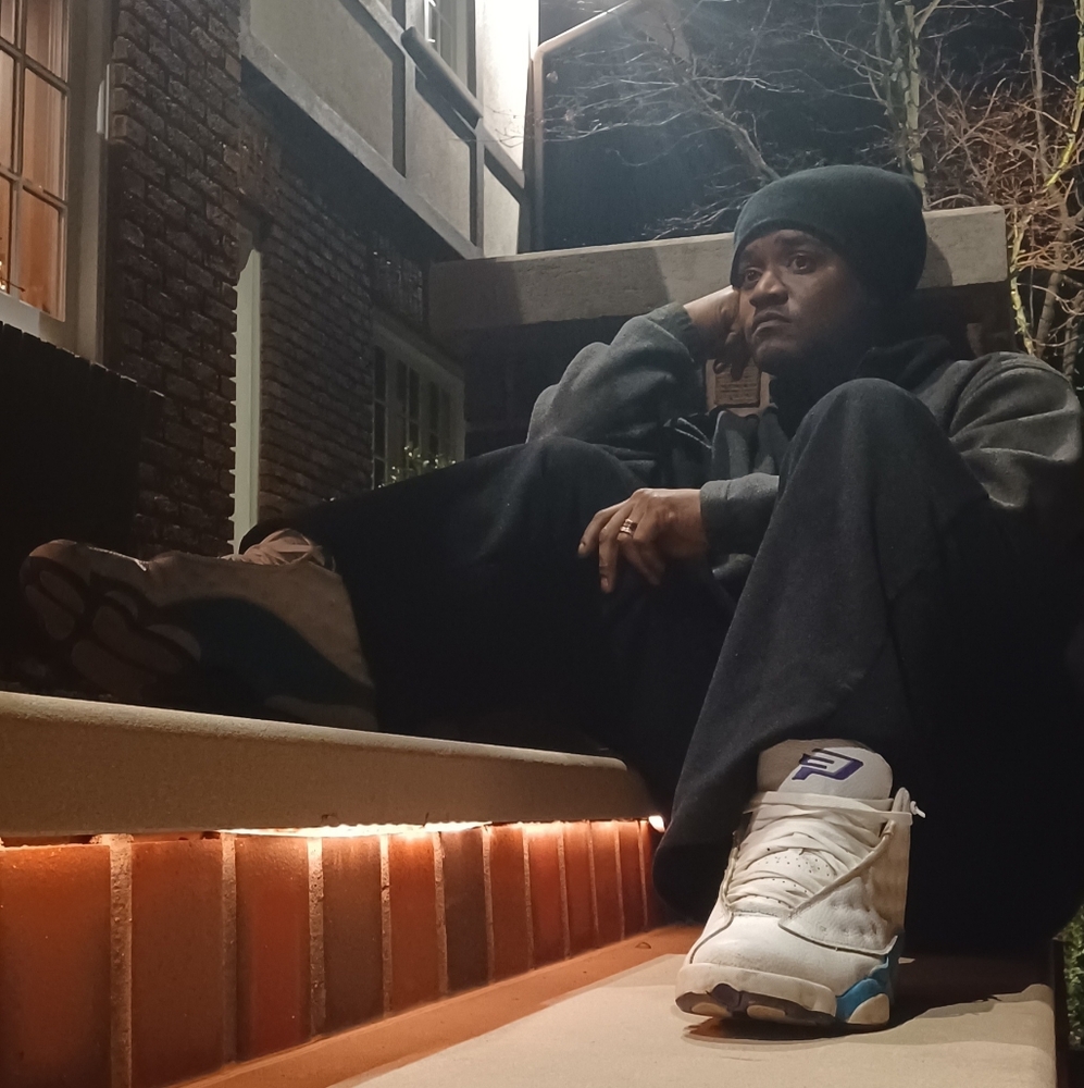 Black Beanie and Gray Sweatshirt